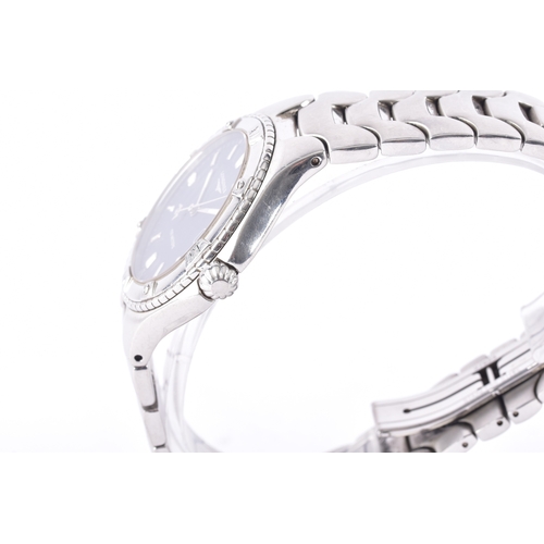 121 - A Longines Conquest S100, quartz stainless steel wristwatch, the blue dial having baton markers and ... 