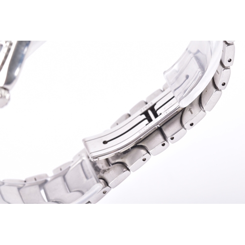 121 - A Longines Conquest S100, quartz stainless steel wristwatch, the blue dial having baton markers and ... 