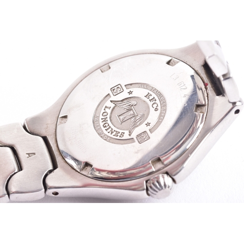 121 - A Longines Conquest S100, quartz stainless steel wristwatch, the blue dial having baton markers and ... 