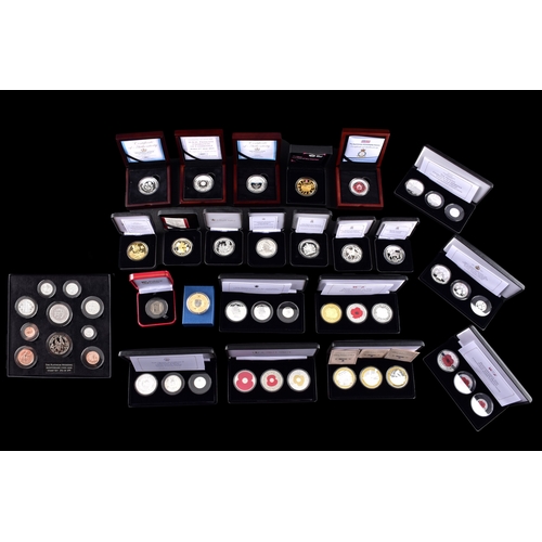 118 - A collection of commemorative coins including Queen Elizabeth II 2015 silver proof coin, a 1977 silv... 