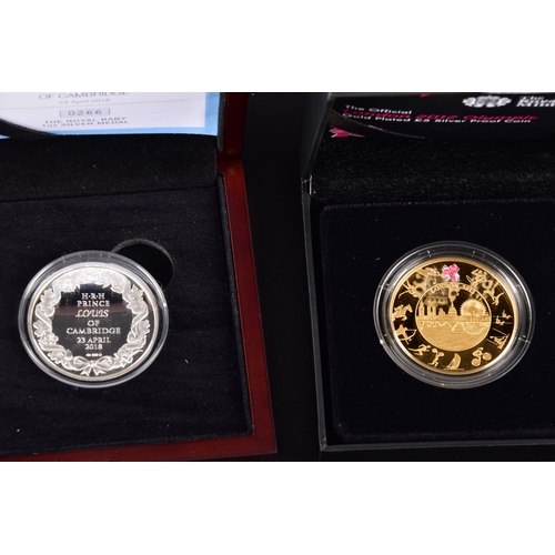 118 - A collection of commemorative coins including Queen Elizabeth II 2015 silver proof coin, a 1977 silv... 