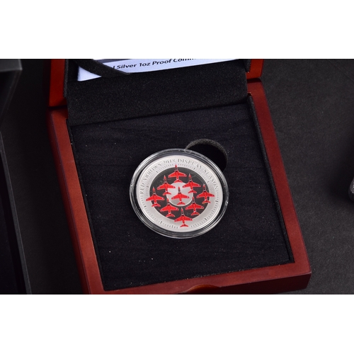 118 - A collection of commemorative coins including Queen Elizabeth II 2015 silver proof coin, a 1977 silv... 