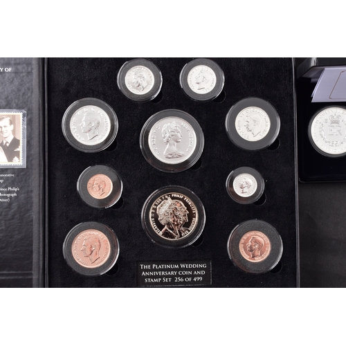 118 - A collection of commemorative coins including Queen Elizabeth II 2015 silver proof coin, a 1977 silv... 
