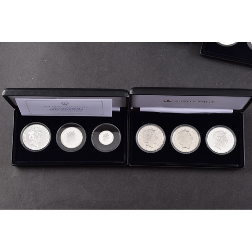 118 - A collection of commemorative coins including Queen Elizabeth II 2015 silver proof coin, a 1977 silv... 