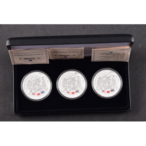 118 - A collection of commemorative coins including Queen Elizabeth II 2015 silver proof coin, a 1977 silv... 