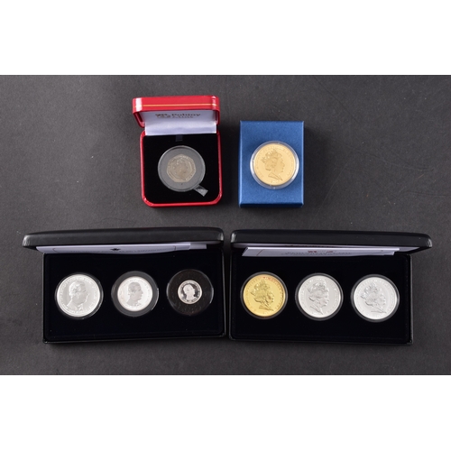 118 - A collection of commemorative coins including Queen Elizabeth II 2015 silver proof coin, a 1977 silv... 