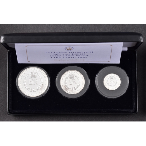 118 - A collection of commemorative coins including Queen Elizabeth II 2015 silver proof coin, a 1977 silv... 