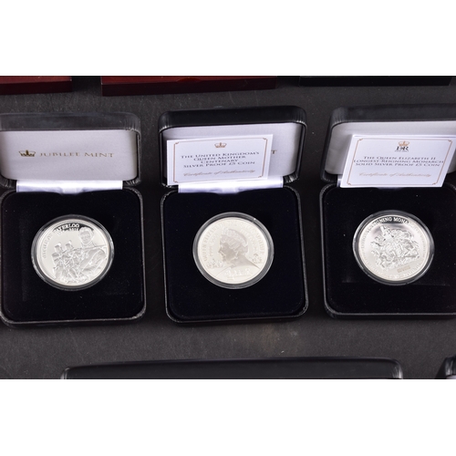 118 - A collection of commemorative coins including Queen Elizabeth II 2015 silver proof coin, a 1977 silv... 