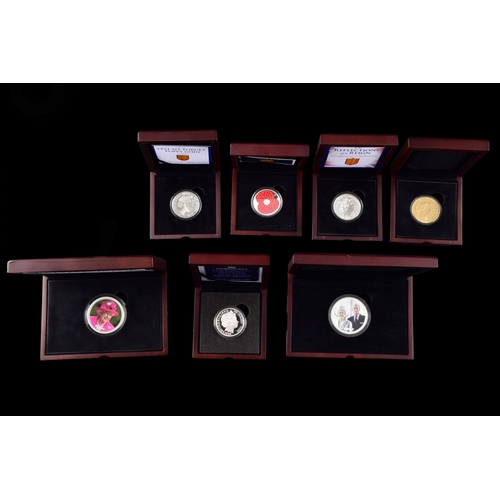 85 - A collection of silver coins including H.M. Queen Elizabeth II 'the longest reigning monarch' silver... 