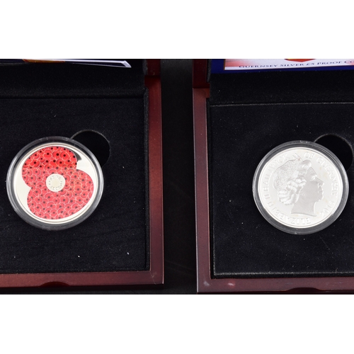 85 - A collection of silver coins including H.M. Queen Elizabeth II 'the longest reigning monarch' silver... 