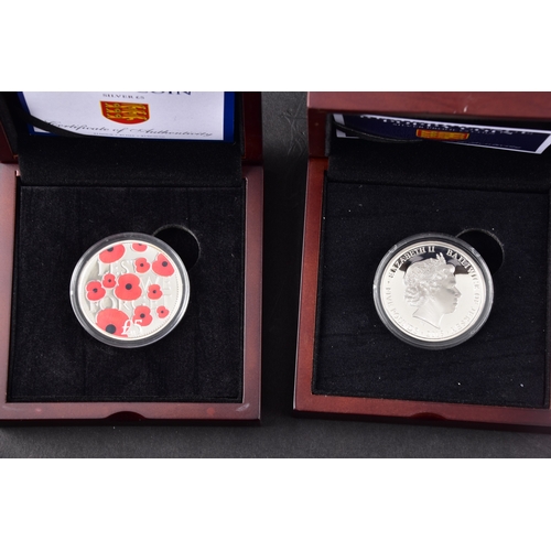 85 - A collection of silver coins including H.M. Queen Elizabeth II 'the longest reigning monarch' silver... 