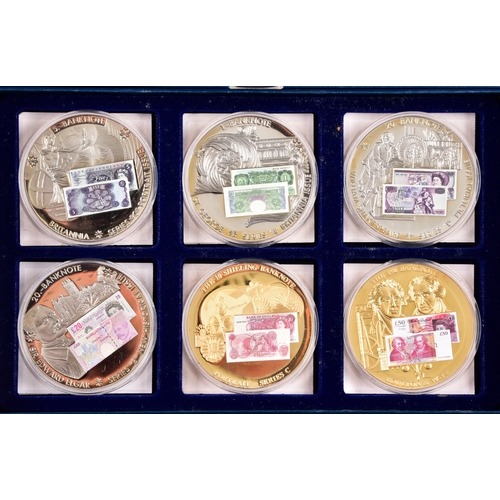 87 - Four boxed sets of Windsor Mint bank note commemorative coins.