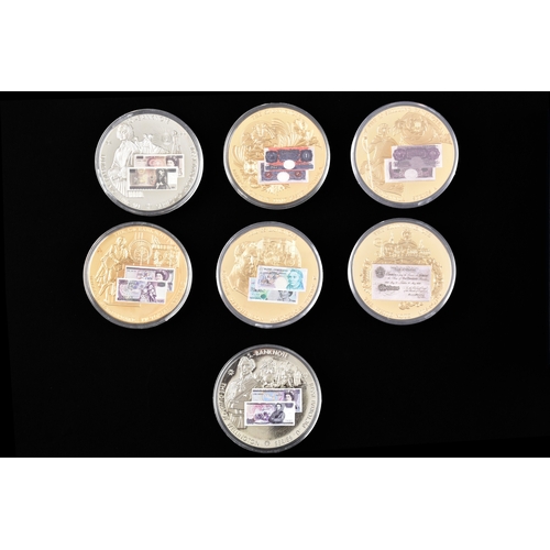 87 - Four boxed sets of Windsor Mint bank note commemorative coins.