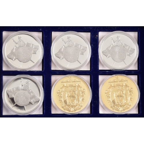 87 - Four boxed sets of Windsor Mint bank note commemorative coins.