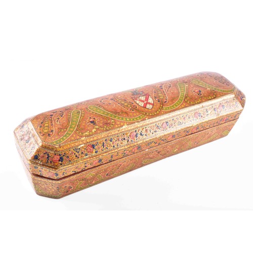 345 - A 19th century Persian papier-mache stationery box, of elongated octagonal form, the hinged cover ri... 
