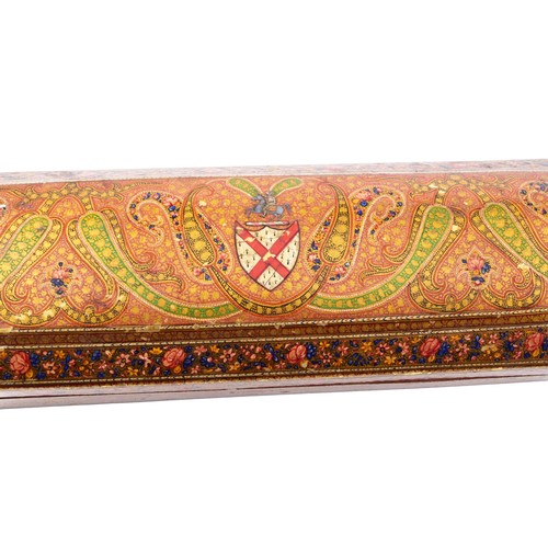 345 - A 19th century Persian papier-mache stationery box, of elongated octagonal form, the hinged cover ri... 