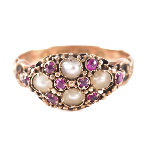 9 - An 18ct yellow gold split pearl and ruby cluster ring, hallmarked for Birmingham 1867, size K.