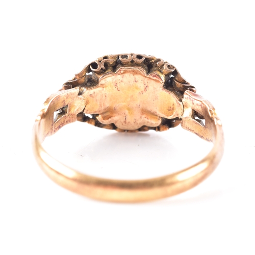 9 - An 18ct yellow gold split pearl and ruby cluster ring, hallmarked for Birmingham 1867, size K.