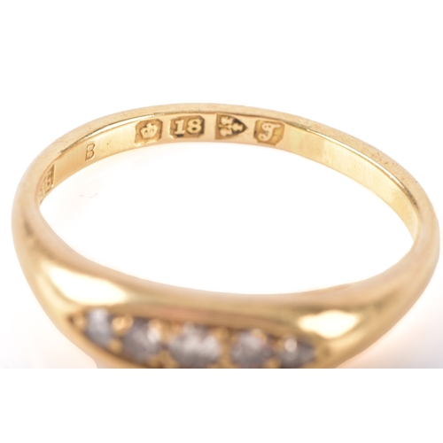 11 - An 18ct yellow gold diamond five stone ring, hallmarked for Chester 1919, size N.