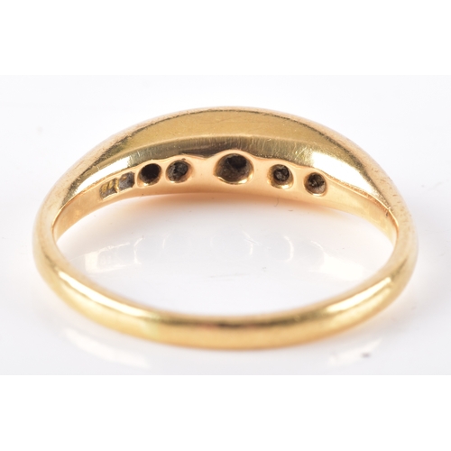 11 - An 18ct yellow gold diamond five stone ring, hallmarked for Chester 1919, size N.