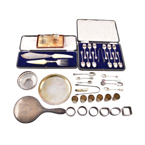 209 - A collection of silver items including seven napkin rings of various dates and maker's, an Edward VI... 