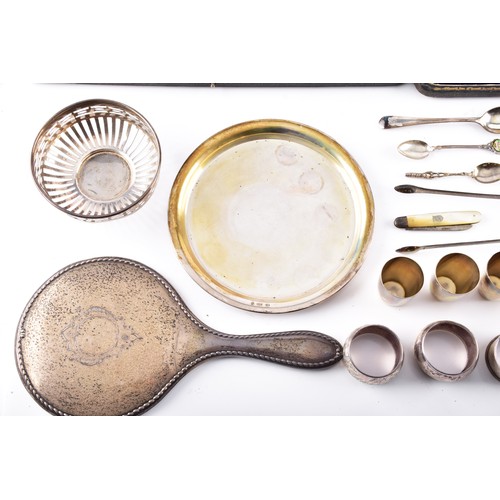 209 - A collection of silver items including seven napkin rings of various dates and maker's, an Edward VI... 