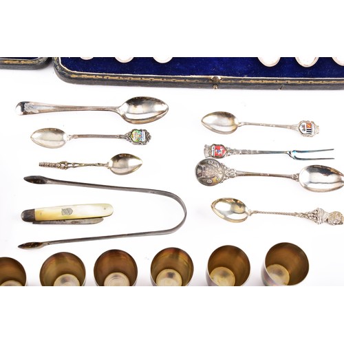 209 - A collection of silver items including seven napkin rings of various dates and maker's, an Edward VI... 