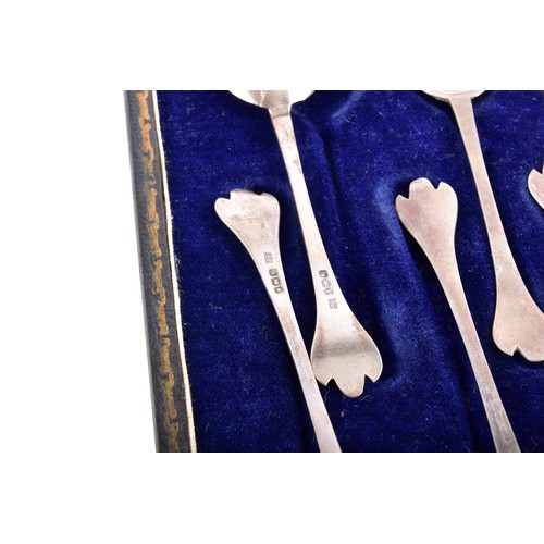 209 - A collection of silver items including seven napkin rings of various dates and maker's, an Edward VI... 