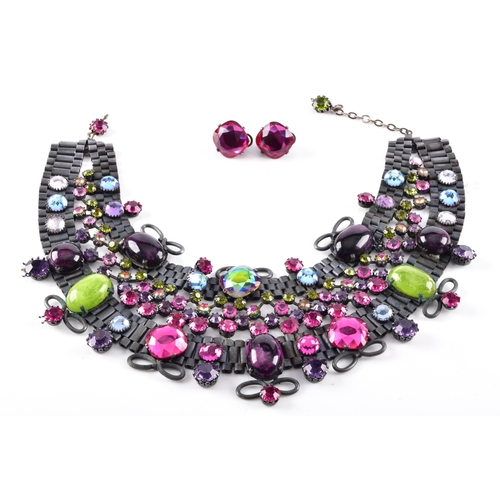 77 - A mid to late 20th century statement costume necklace and matching earrings, the necklace formed as ... 