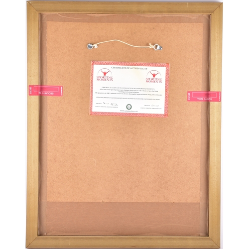 350 - A framed Manchester United red home shirt, the reverse printed 'Rooney' and numbered 10, signed in b... 