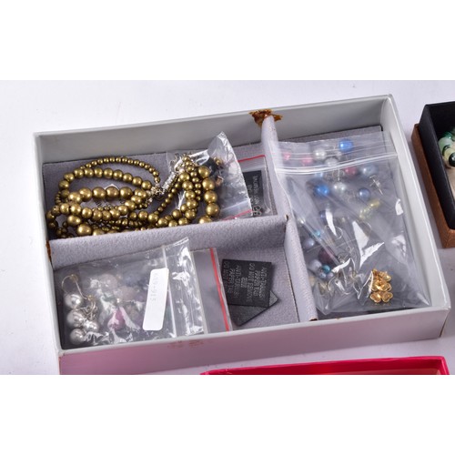 71 - A large collection of Butler & Wilson pieces, including three bangles, four key rings, a owl nec... 