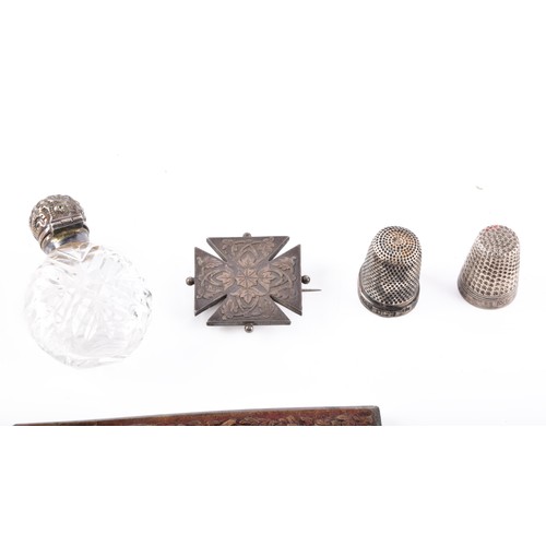 211 - A group lot of assorted silver and other items, a pair of Victorian sugar tongs hallmarked for Londo... 