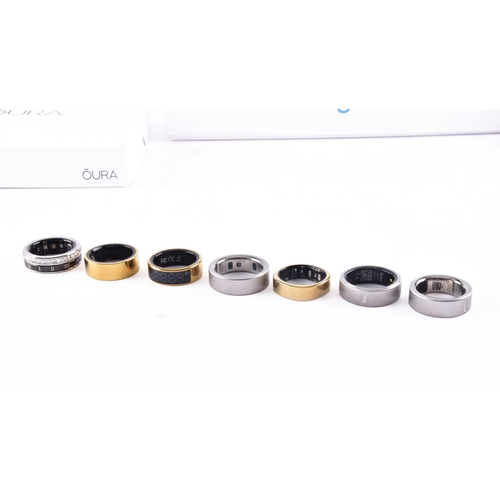 43 - A collection of Oura smart fitness rings, and a Samsung smart ring, untested, but most appear to cha... 