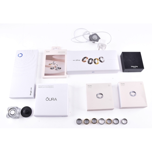 43 - A collection of Oura smart fitness rings, and a Samsung smart ring, untested, but most appear to cha... 
