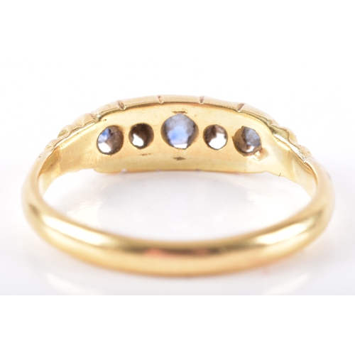 22 - An 18ct yellow gold, sapphire, and diamond ring, claw-set with three mixed-cut sapphires, and two di... 