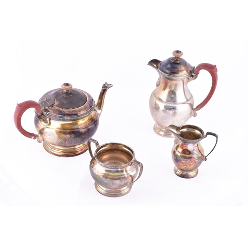 An Elizabeth II silver four piece tea set, including a tea pot, coffee pot, sugar bowl and a milk jug, hallmarked for Birmingham 1959 by Adie Brothers Ltd. (4)