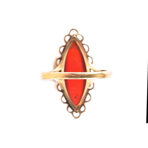 9 - A 9ct yellow gold marquise carnelian cocktail ring, with scalloped wirework bezel, hallmarked for Lo... 