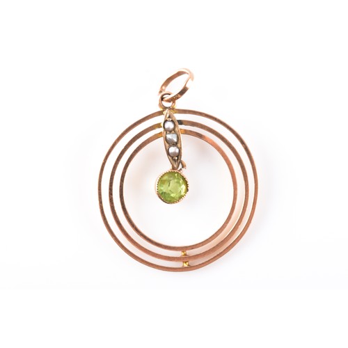 17 - A 9ct yellow gold peridot and seed pearl openwork pendant, 2.3 cm diameter, together with a peridot ... 