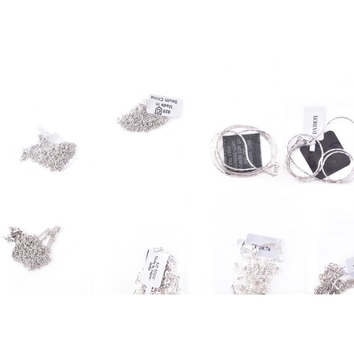 56 - A large collection of silver chains and bracelets, featuring an array of link styles and lengths, 24... 