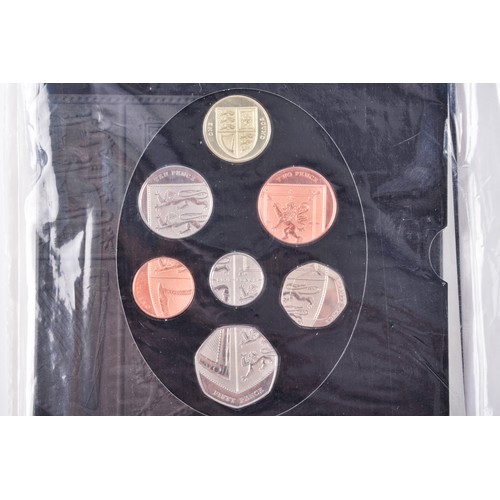 28 - A 2008 Royal Shield of Arms brilliant uncirculated 7-coin set by The Royal Mint, together with a H.M... 