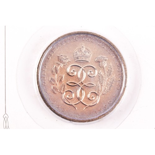 28 - A 2008 Royal Shield of Arms brilliant uncirculated 7-coin set by The Royal Mint, together with a H.M... 