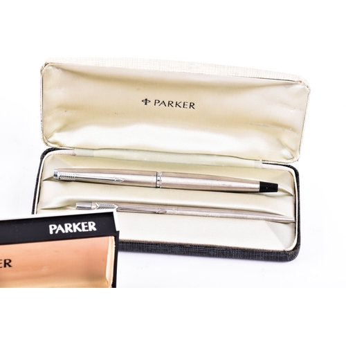 27 - A collection of vintage fountain pens, ballpoint pens and propelling pencils, including Parker, Shea... 