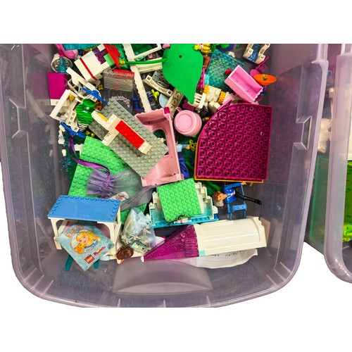 26 - A large collection of assorted LEGO pieces, including loose bricks, baseplates, figures, animals, bu... 