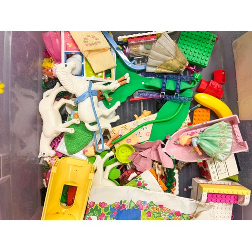 26 - A large collection of assorted LEGO pieces, including loose bricks, baseplates, figures, animals, bu... 