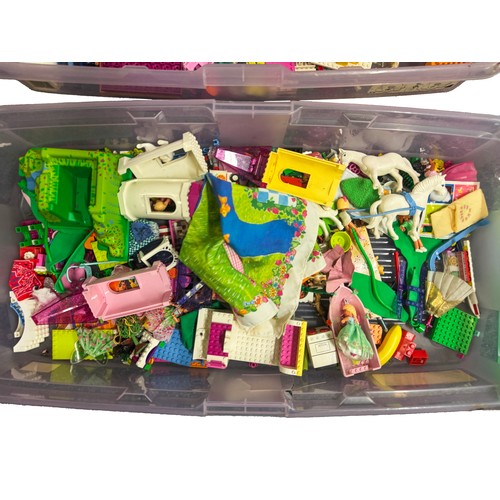 26 - A large collection of assorted LEGO pieces, including loose bricks, baseplates, figures, animals, bu... 