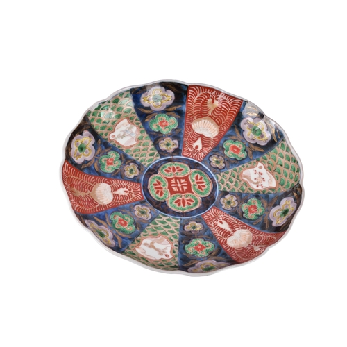 A collection of eleven Japanese Imari porcelain plates and dishes ...