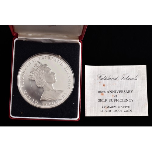 A silver proof 100th anniversay of self sufficiency coin, boxed.