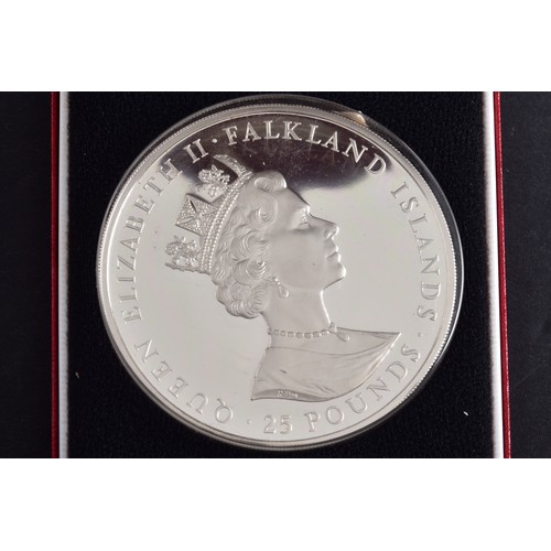 A silver proof 100th anniversay of self sufficiency coin, boxed.