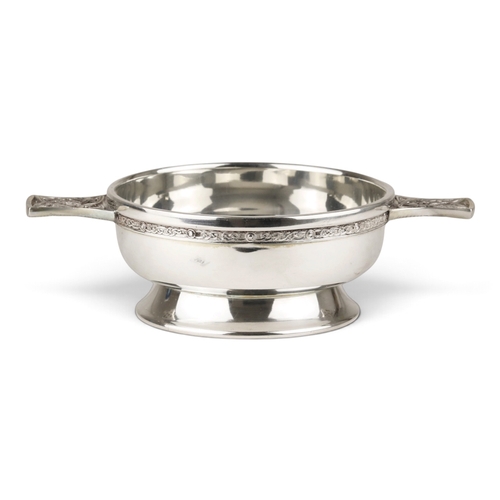 SILVER PLATED TWO HANDLED QUAICH. RAISED ON A CIRCULAR FOOT. H: 2 ...