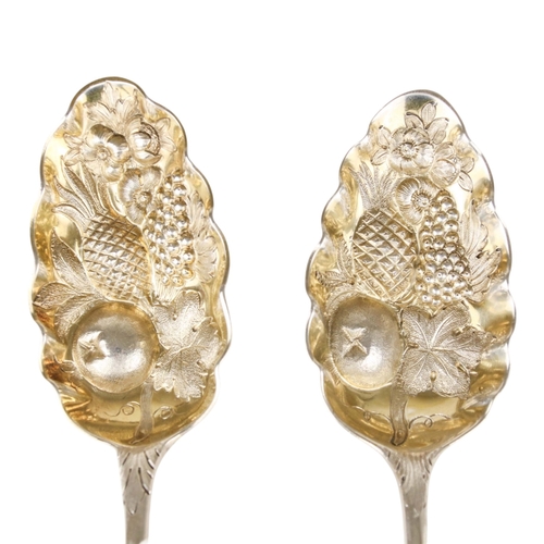 PAIR OF BRIGHT CUT SILVER BERRY SPOONS WITH EMBOSSED & GILDED BOWLS ...